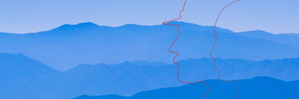 Wavy blue lines behind the drawn outline of two faces.