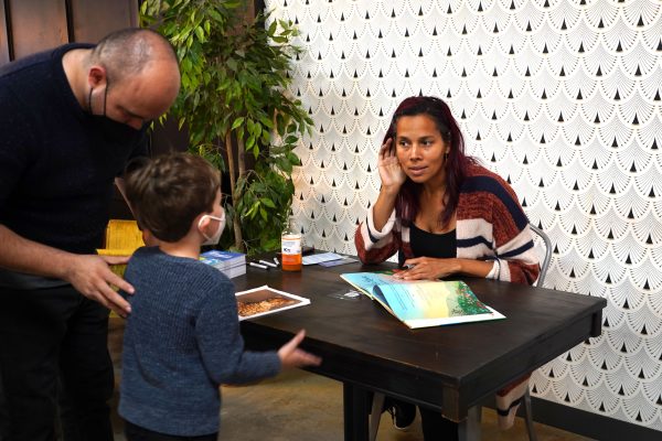 Rhiannon Giddens signs her book.